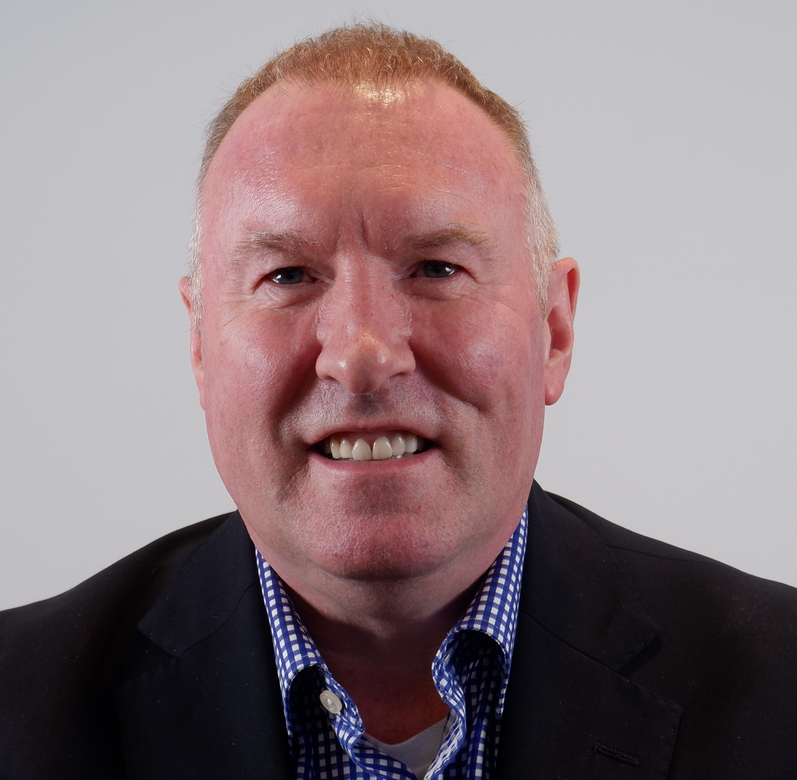 headshot of Moderator: Douglas Queen