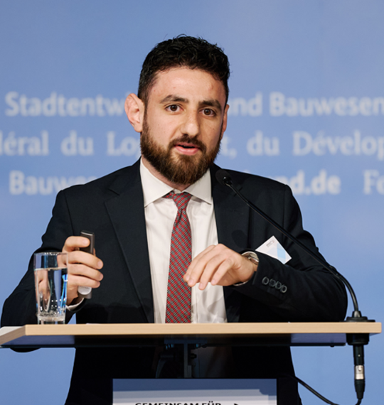 headshot of Ali Bargu
